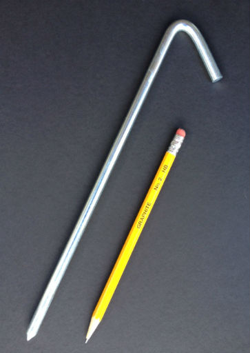10 inch long steel tarp stake with zinc electroplated protective finish with pencil for scale