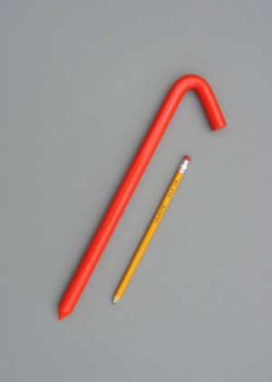 12 inch long hook style stake with a baked on safety orange enamel paint and a pencil for scale