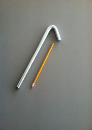 12 inch long hook style steel stake with an electroplated protective finish and a pencil for scale