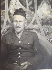 black and white photograph of man in military uniform