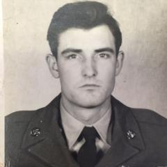 black and white photograph of a serious man in military uniform